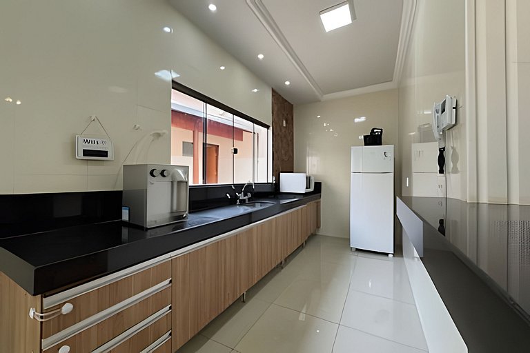 Espaçosa casa próxima ao Centro